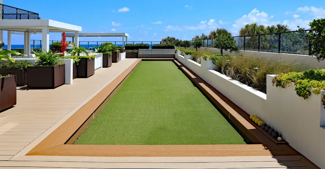 Artificial grass installation on garden Tile Grouting